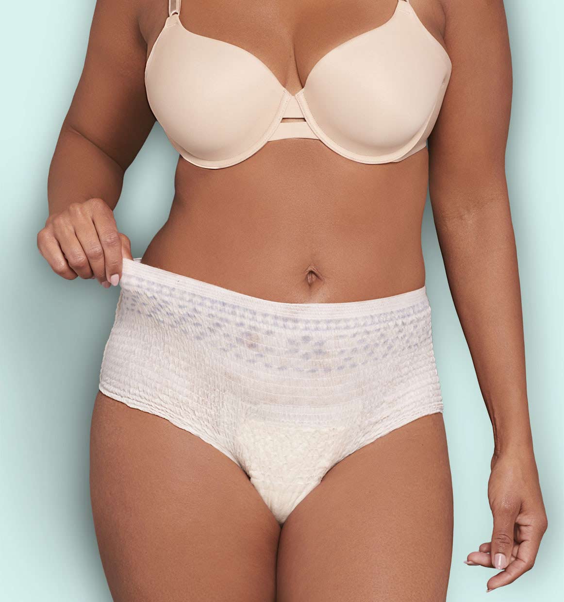 Model Wearing Depend® Incontinence Fresh Protection™ Plus+ Underwear for Women